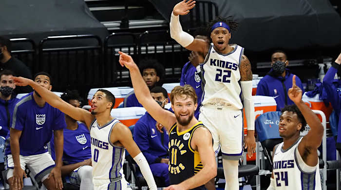 Kings forward Richaun Holmes (22) guard Buddy Hield (24) guard Tyrese Haliburton (0) and Pacers forward Domantas Sabonis (11)
